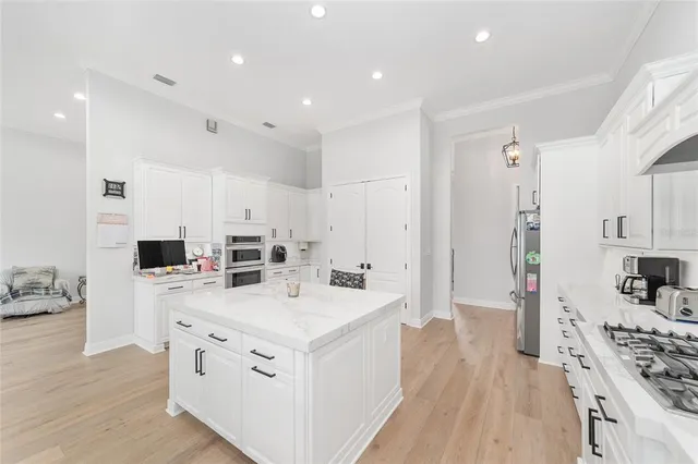 a view of a hallway with windows