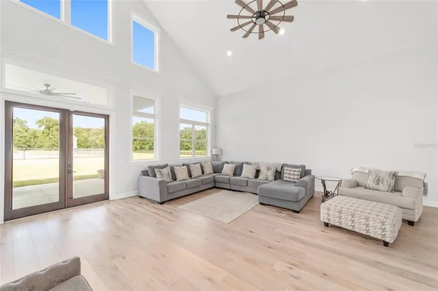 a bedroom with a bed and flat screen tv