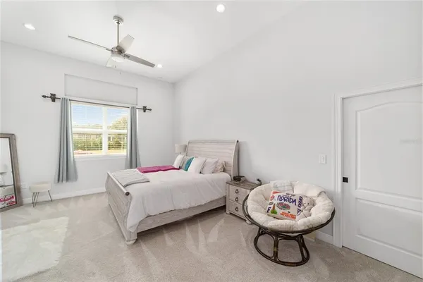 a spacious bathroom with a double vanity sink mirror and double