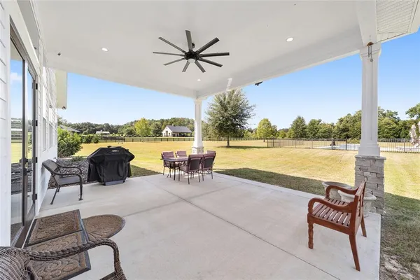 a work room with furniture and window