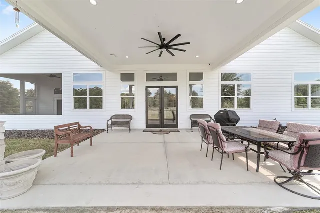 a kitchen with cabinets and washer dryer