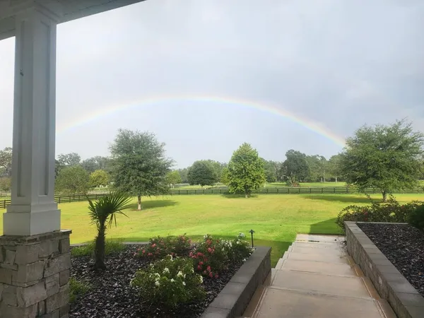 a view of a lake with a yard