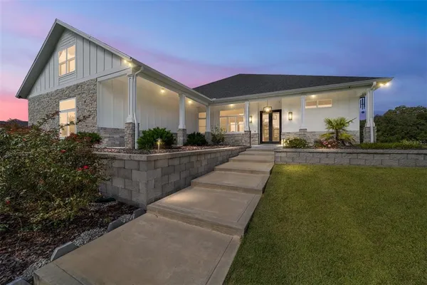 a view of a house with a swimming pool