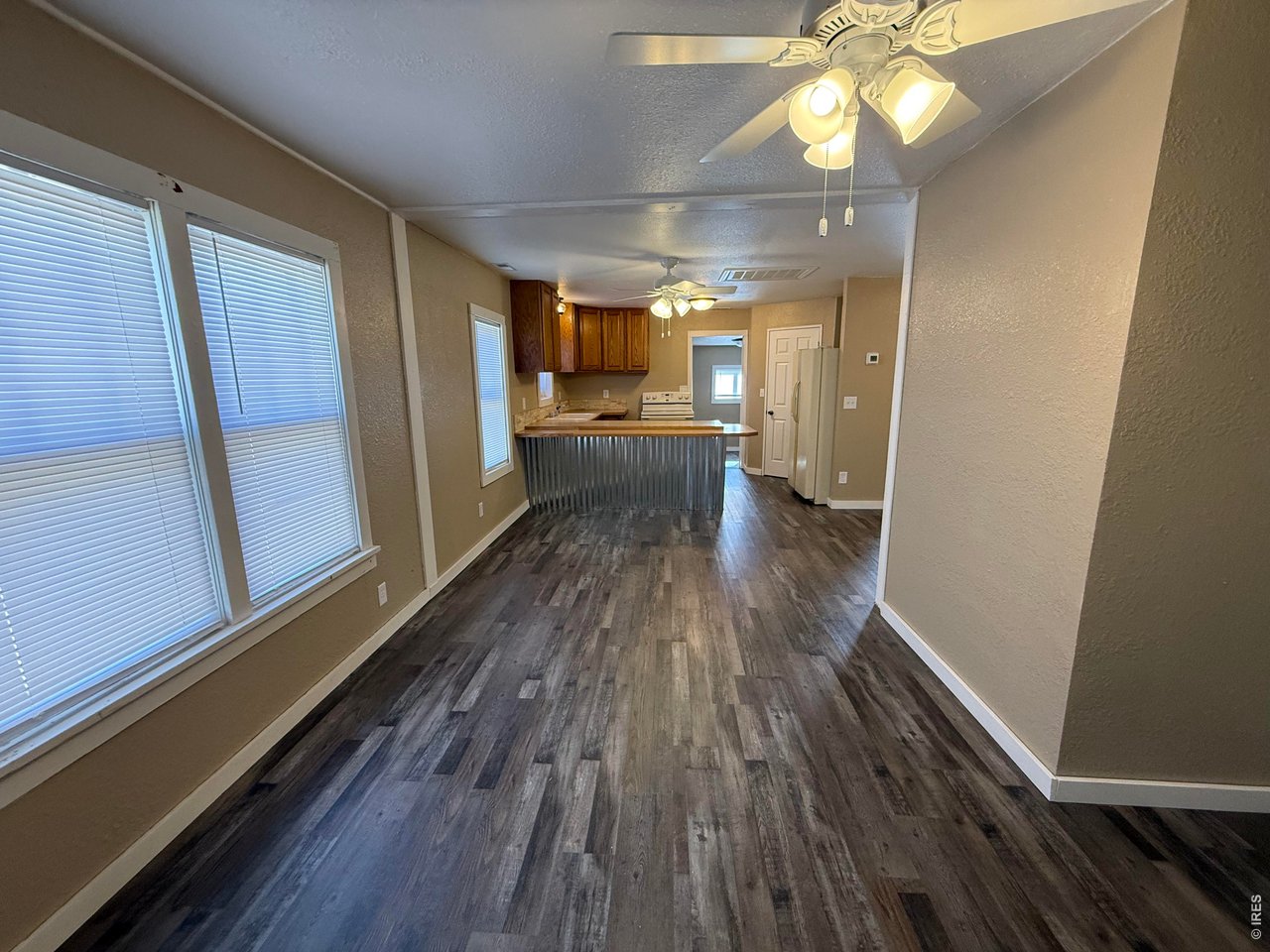 709 South 3rd Street Lamar, CO 81052 - Photo 5 of 20 a view of gallery with wooden floor