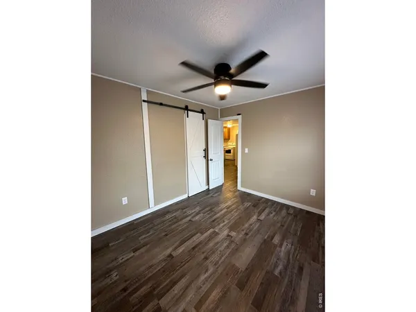 a view of a livingroom with a ceiling fan