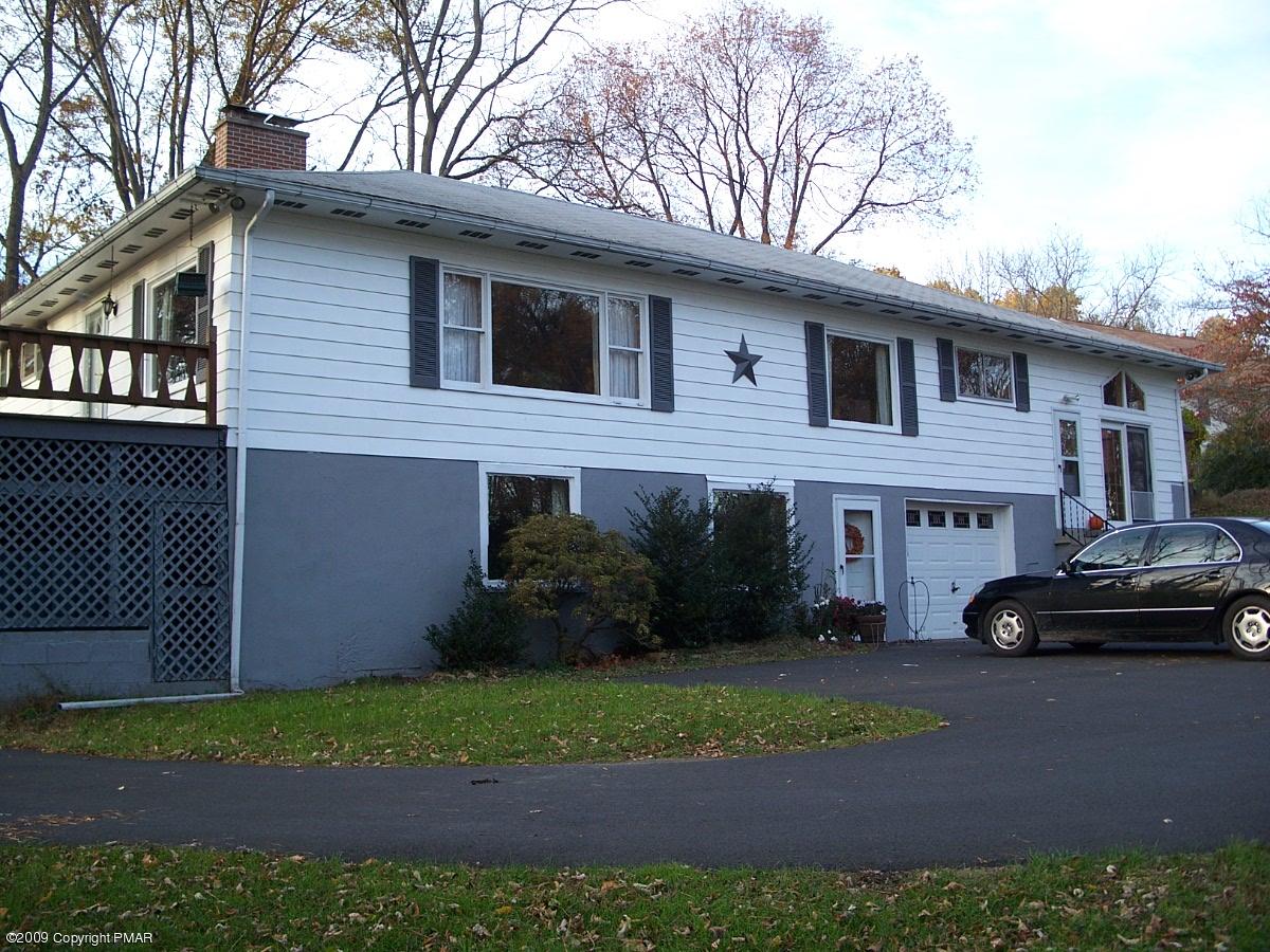 a car parked in front of a house