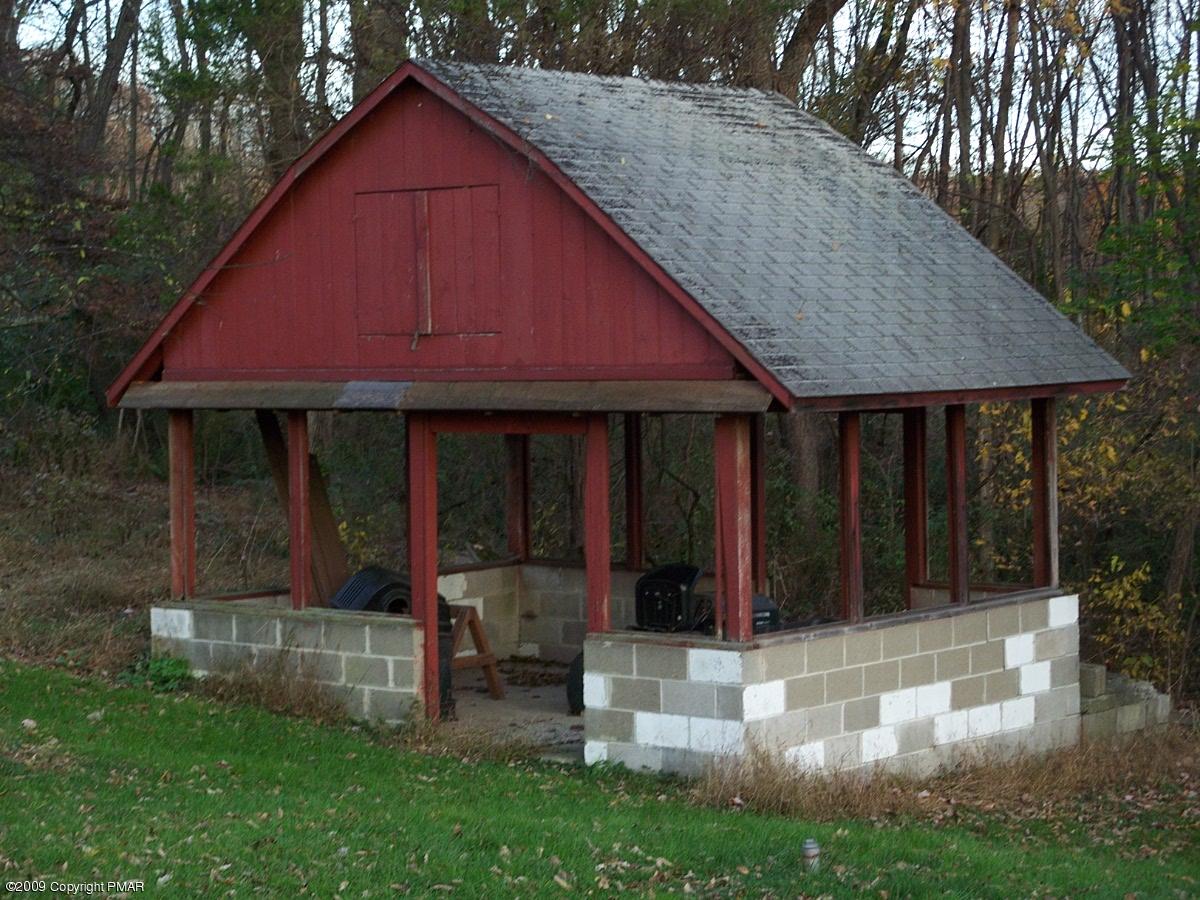 137 Independence Road East Stroudsburg, PA 18301 - Photo 4 of 15 a front view of a house with garden