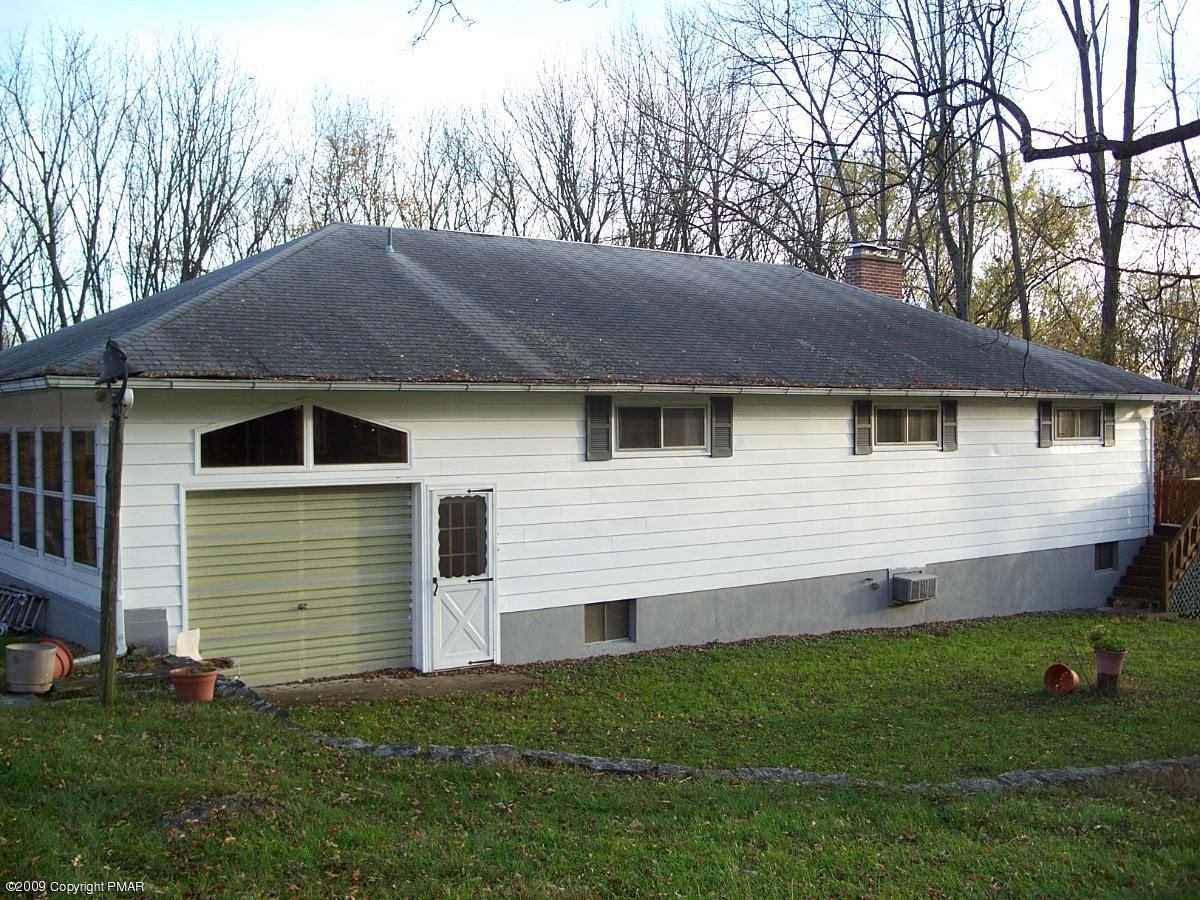 137 Independence Road East Stroudsburg, PA 18301 - Photo 7 of 15 a view of a house with a backyard