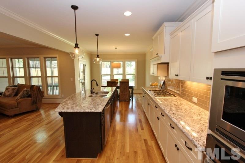 5807 Faringdon Place Raleigh, NC 27609 - Photo 5 of 24 Gallery Image 5