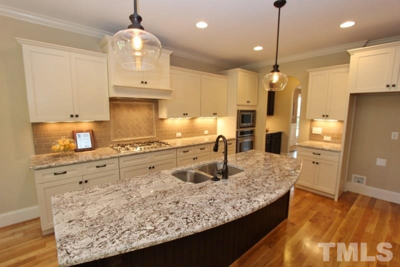 5807 Faringdon Place Raleigh, NC 27609 - Photo 6 of 24 Gallery Image 6