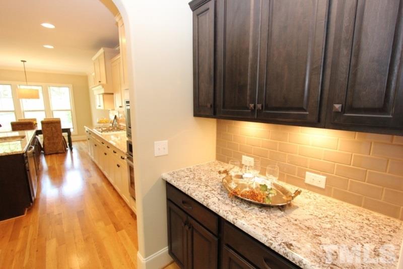 5807 Faringdon Place Raleigh, NC 27609 - Photo 7 of 24 Gallery Image 7