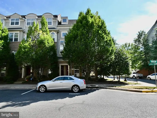 a view of street with parked cars