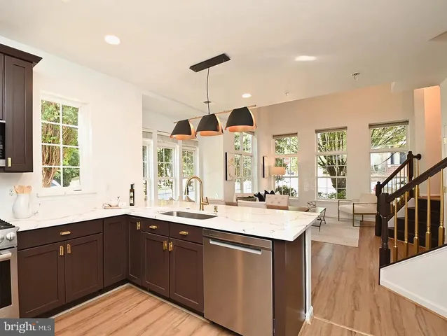 a kitchen with lots of counter space and a sink