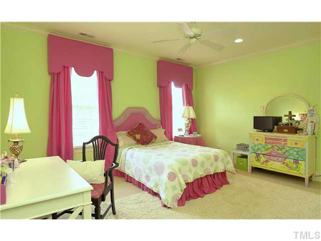 323 Marlowe Road Raleigh, NC 27609 - Photo 15 of 25 a bedroom with a bed table and a window