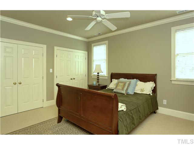 323 Marlowe Road Raleigh, NC 27609 - Photo 18 of 25 a bedroom with a bed and window