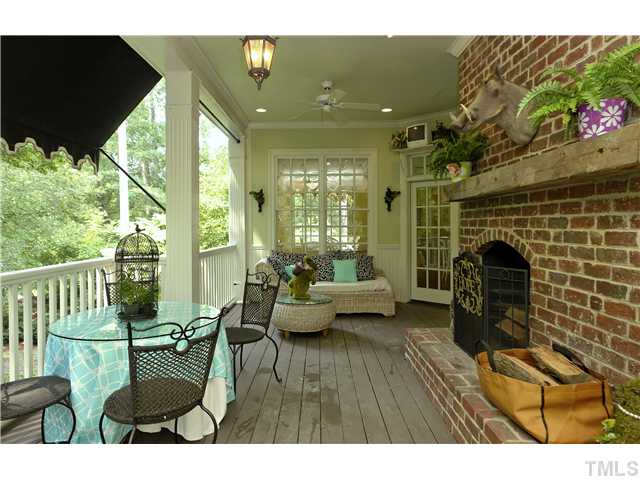 323 Marlowe Road Raleigh, NC 27609 - Photo 20 of 25 a living room with furniture and a fireplace