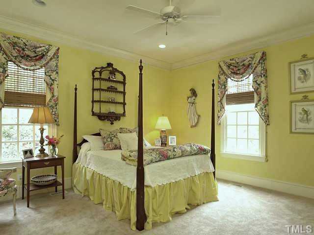 323 Marlowe Road Raleigh, NC 27609 - Photo 8 of 25 a bedroom with a bed and a window