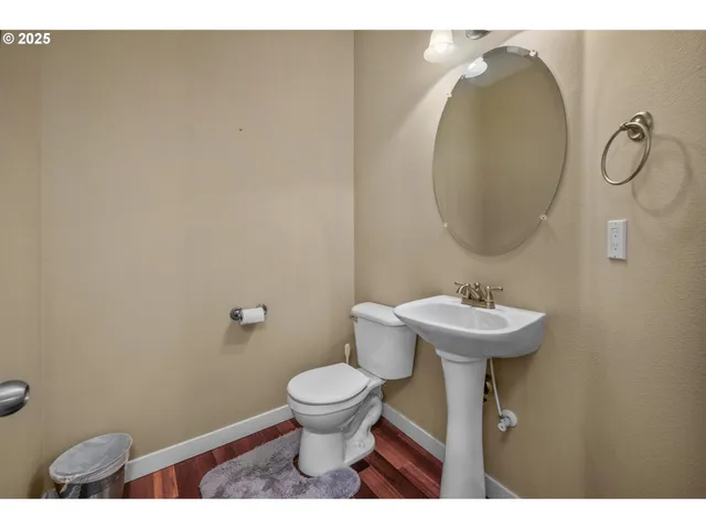 a bathroom with a toilet and a sink