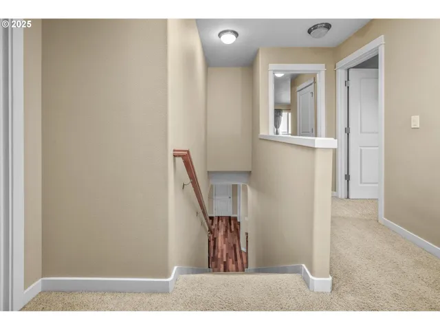 a view of entryway with wooden floor