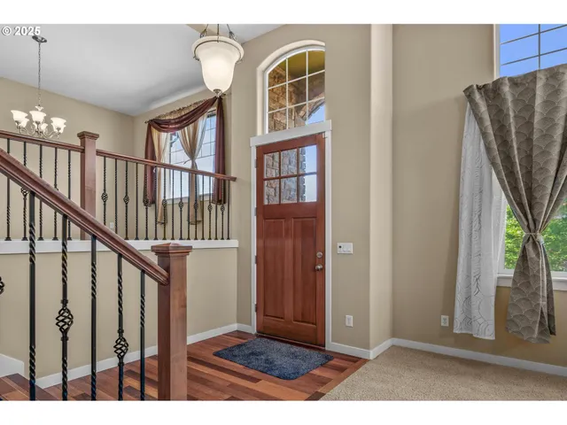 a view of front door with stairs
