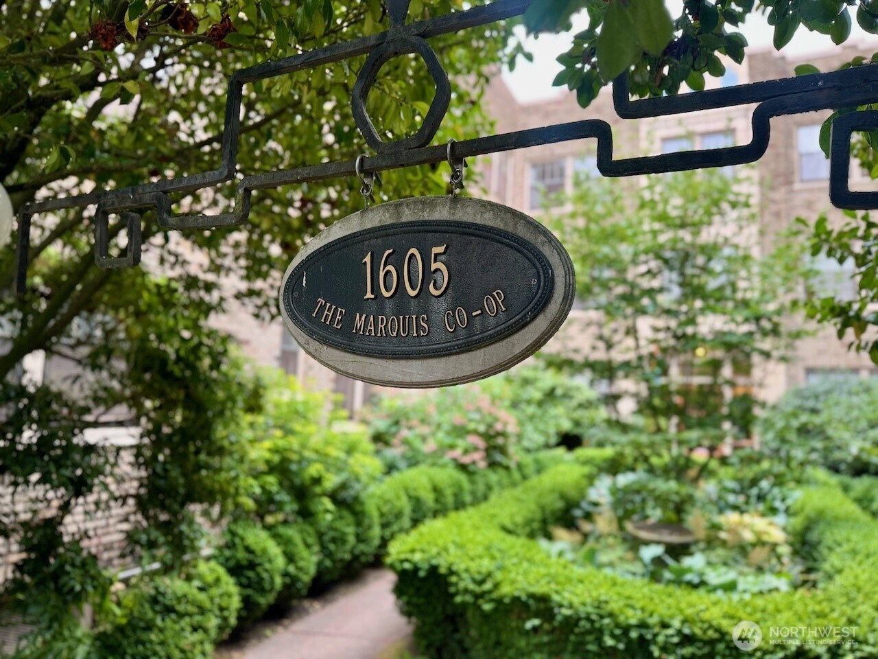 1605 East Olive Street, Unit 307 Seattle, WA 98122 - Photo 13 of 21 a view of a back yard of a building