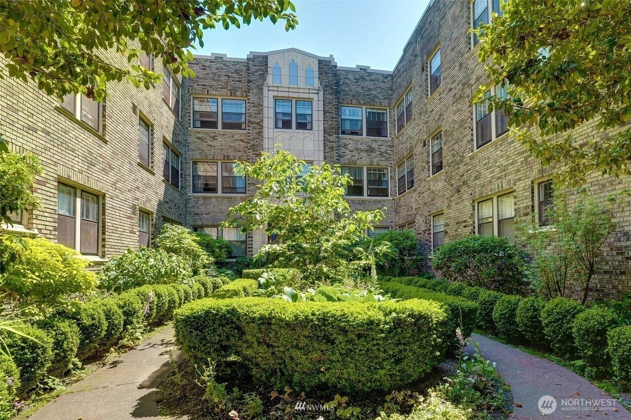 1605 East Olive Street, Unit 307 Seattle, WA 98122 - Photo 14 of 21 a view of a multi story building