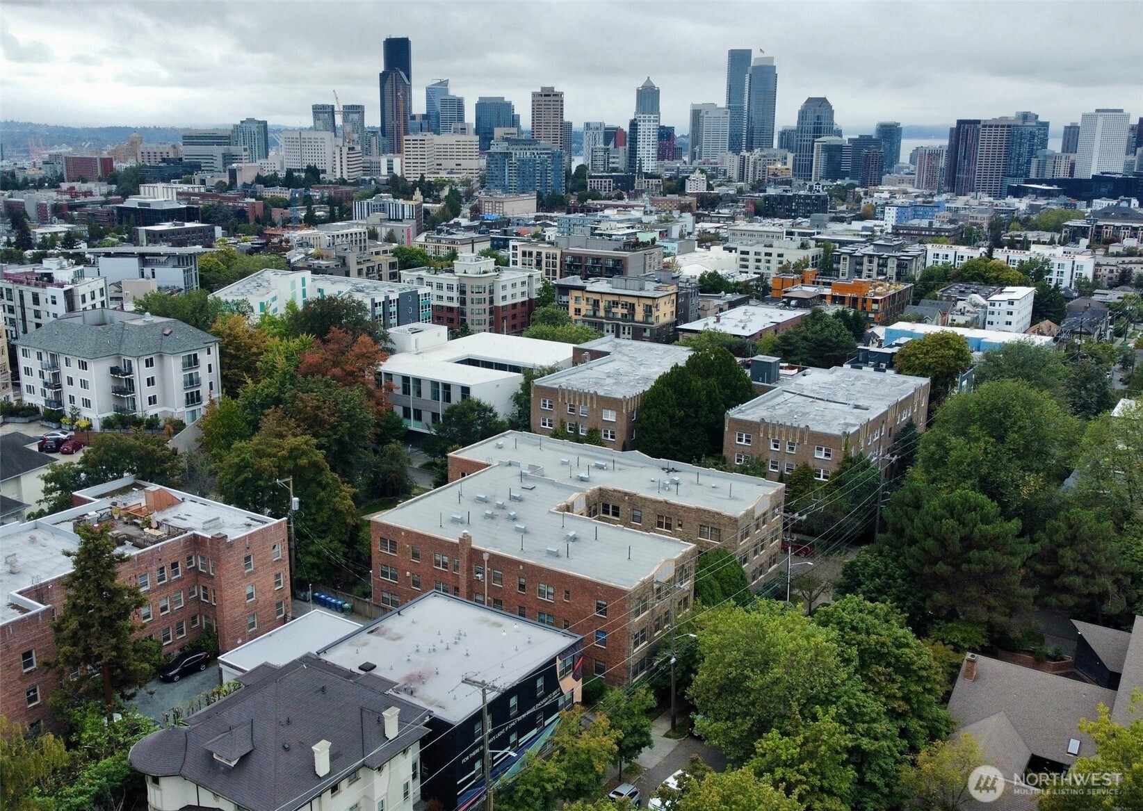 1605 East Olive Street, Unit 307 Seattle, WA 98122 - Photo 21 of 21 an aerial view of a city with lots of residential buildings
