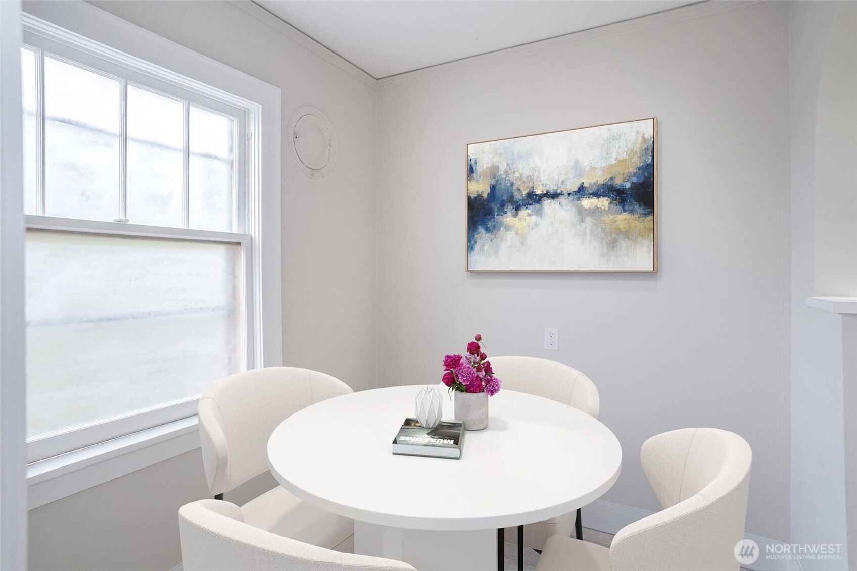 1605 East Olive Street, Unit 307 Seattle, WA 98122 - Photo 4 of 21 a dining room with furniture and window