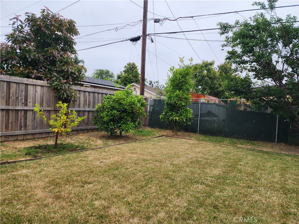 505 South Paula Drive Fullerton, CA 92833 - Photo 20 of 20 a backyard of a house with plants and tree