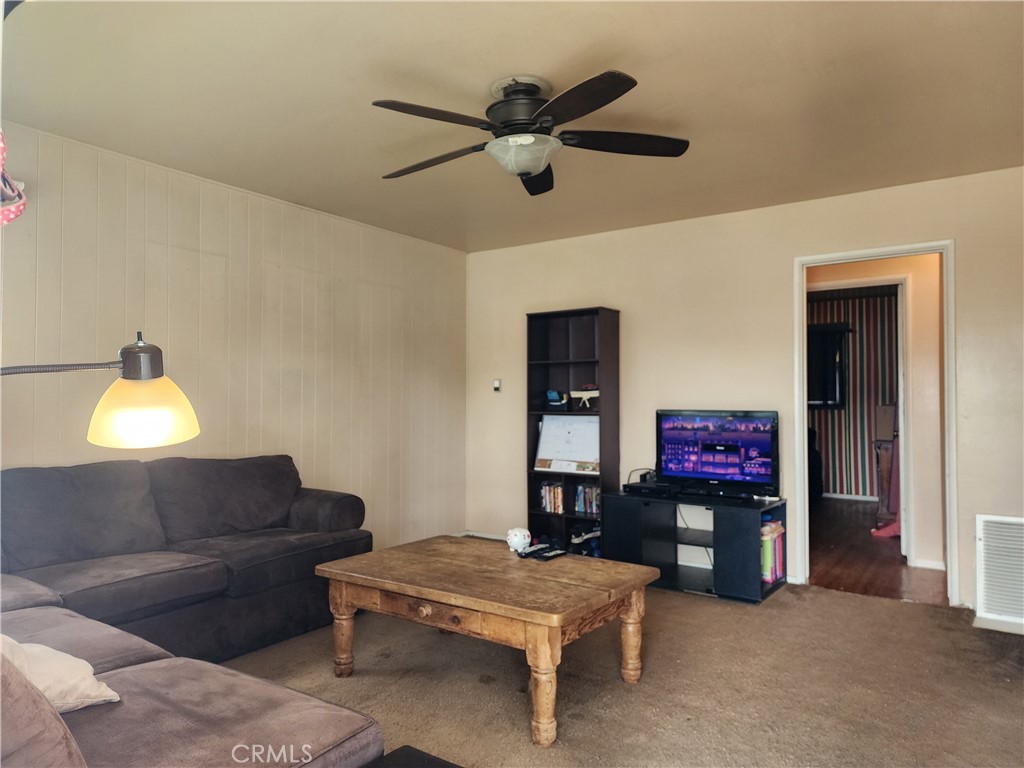 505 South Paula Drive Fullerton, CA 92833 - Photo 2 of 20 a living room with furniture and a flat screen tv