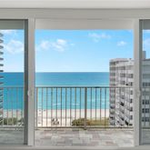 a view of a bathroom with a glass door