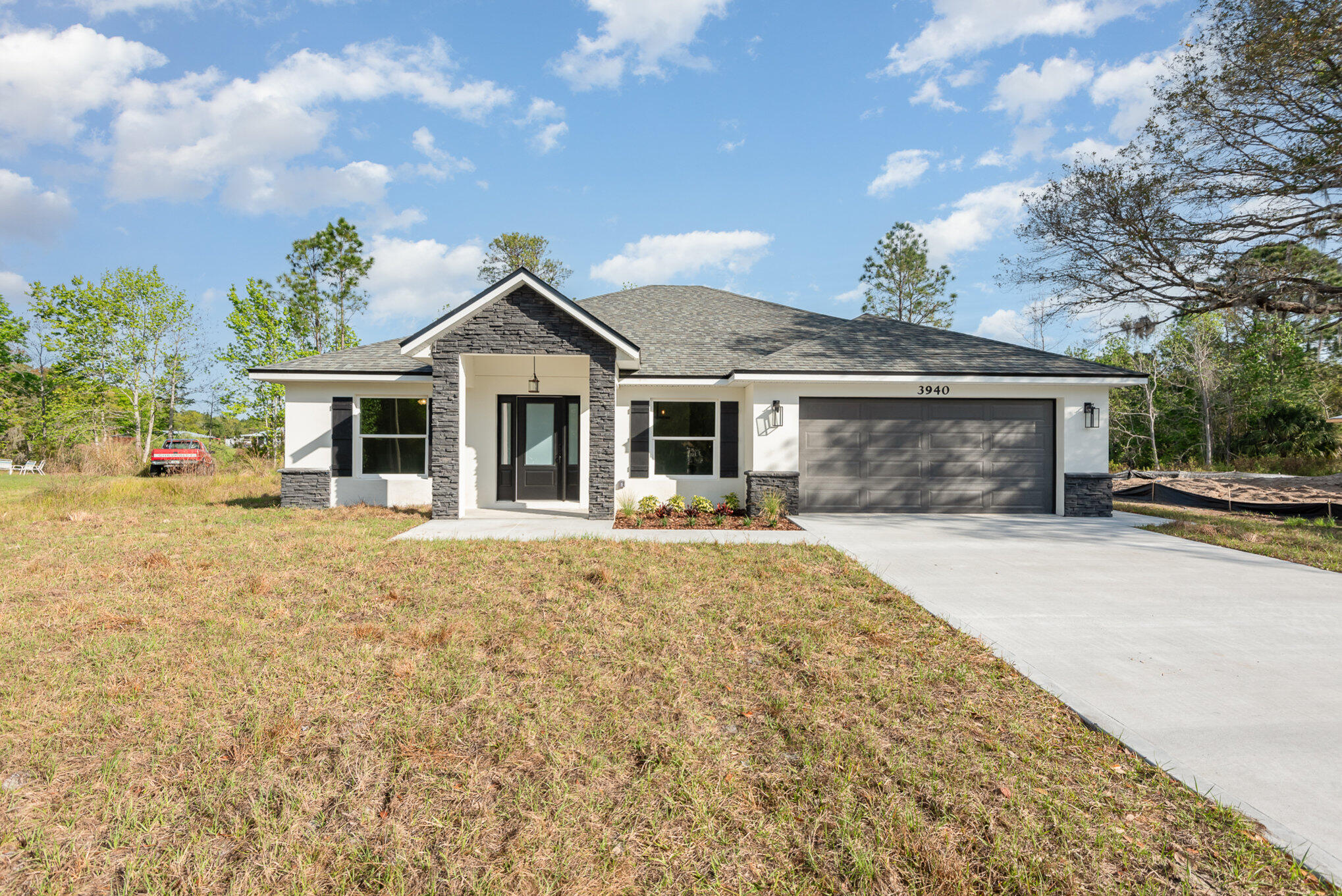 3940 Aurantia Road Mims, FL 32754 - Photo 1 of 24 front
