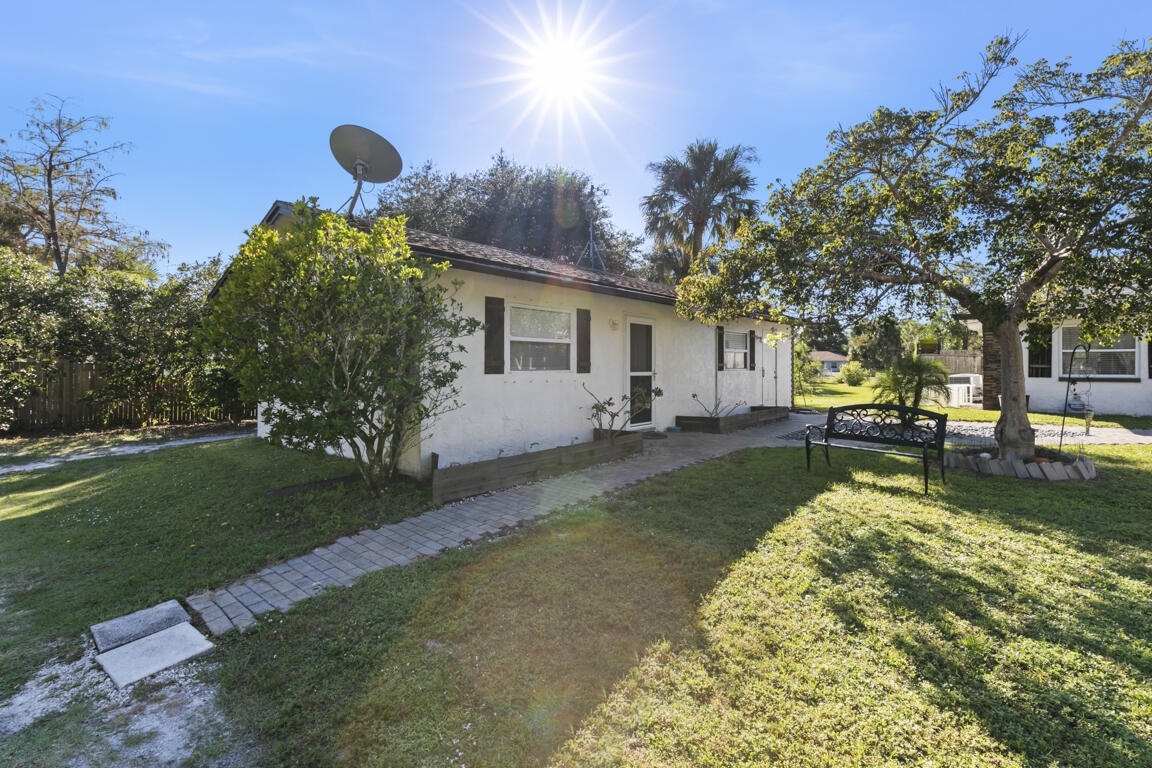 640 27th Street Southwest Naples, FL 34117 - Photo 23 of 37 a house view with a garden space
