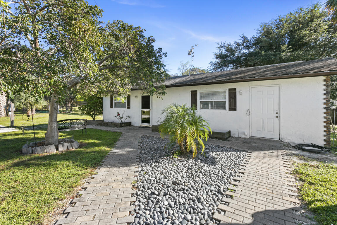 640 27th Street Southwest Naples, FL 34117 - Photo 24 of 37 a house view with a backyard space