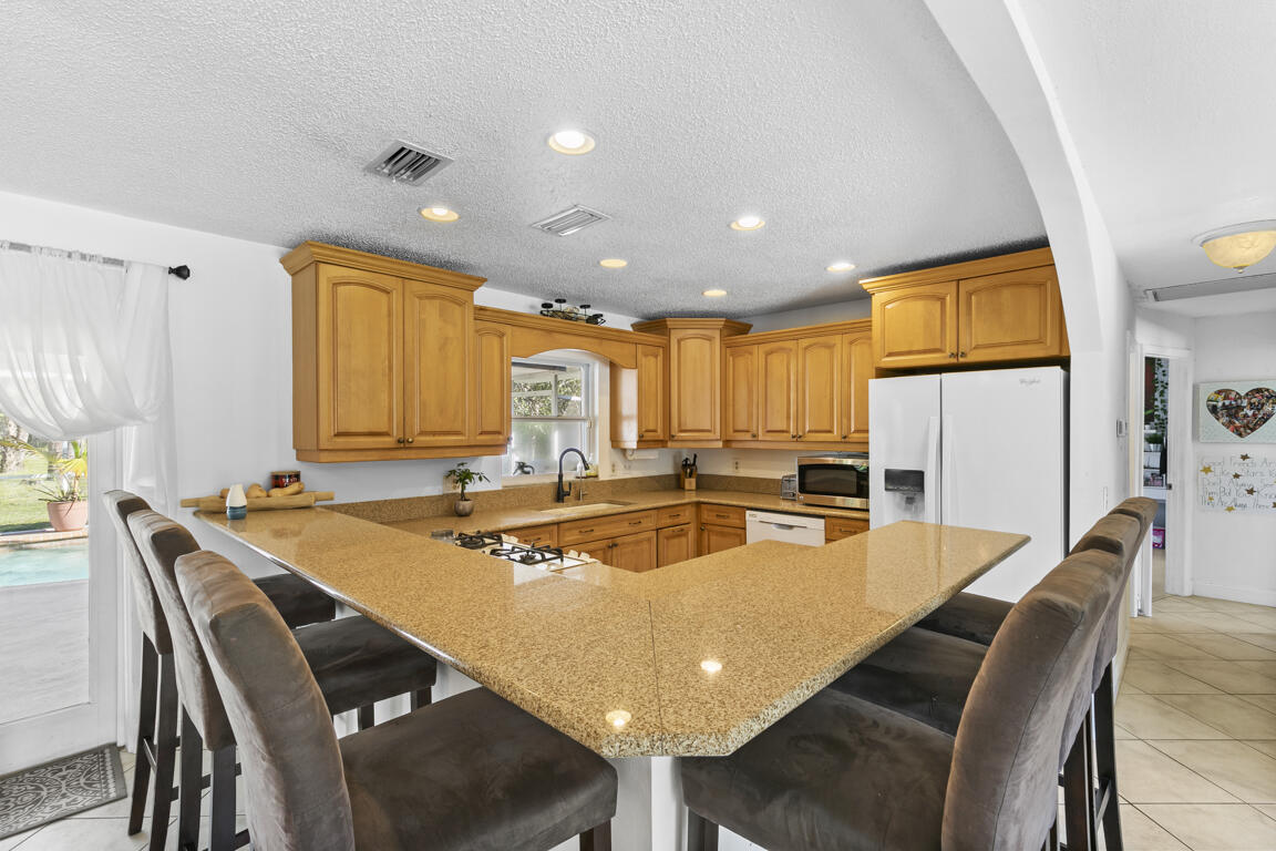 640 27th Street Southwest Naples, FL 34117 - Photo 6 of 37 a dining room with furniture and window