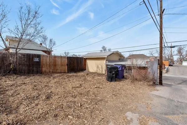 a view of a house with a snow in the background