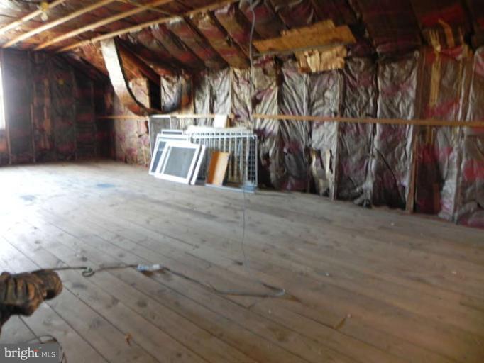 8610 McDaniel Road Baltimore, MD 21237 - Photo 22 of 29 Large unfinished attic with great potential