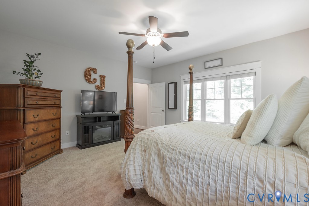 6446 Chestnut Church Road Mechanicsville, VA 23116 - Photo 21 of 49 Carpeted room featuring a ceiling fan with integra