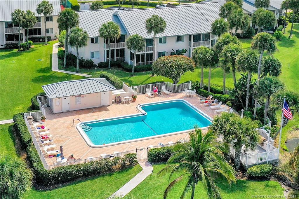484 Northeast Plantation Road, Unit 4106 Jensen Beach, FL 34957 - Photo 15 of 15 a view of a house with a yard