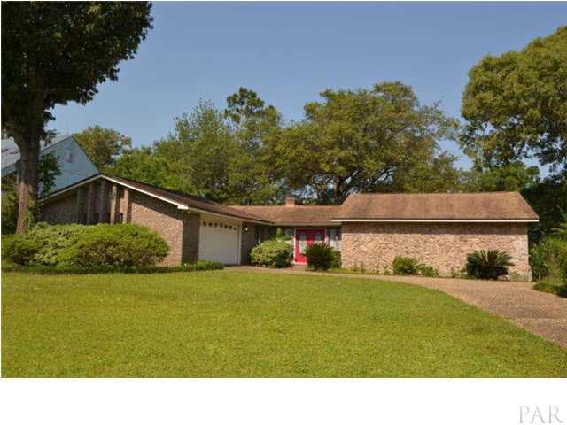 A Stroke of Luck! Step out the back door of this Beau-Tee-Ful 3 bedroom, 2 bath contemporary and tee-it-up on #4 Tee Box at Scenic Hills Country Club.