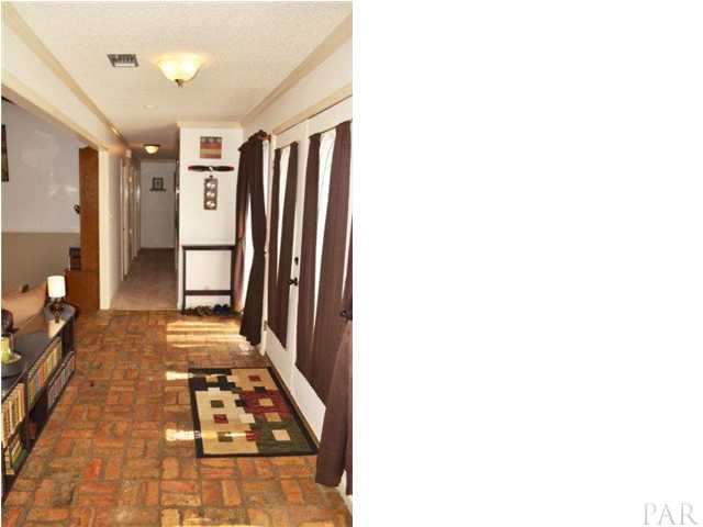 Enter this well-maintained property and appreciate an open foyer with ?real? Old Chicago brick flooring and incredible views of the golf course.