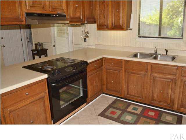 8801 Burning Tree Road Pensacola, FL 32514 - Photo 9 of 24 under-cabinet lighting and counter space.