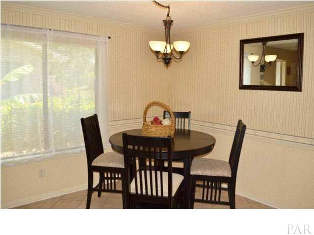 8801 Burning Tree Road Pensacola, FL 32514 - Photo 10 of 24 Adjoining the kitchen is an 11? x 12? breakfast room