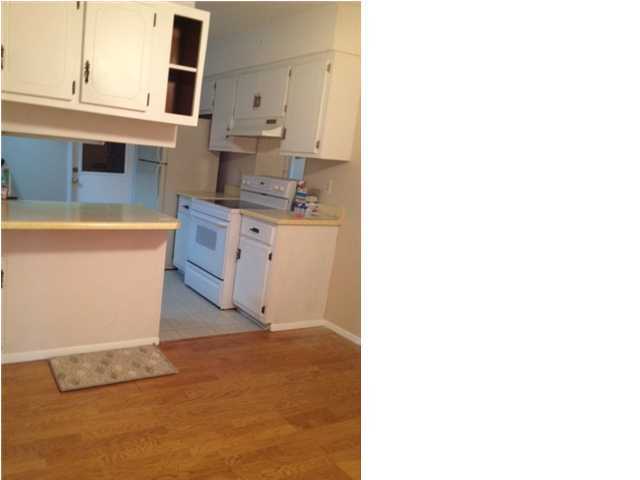 216 Ridge Lake Road Crestview, FL 32536 - Photo 6 of 12 a kitchen with cabinets and a stove