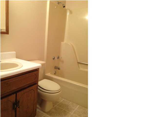 216 Ridge Lake Road Crestview, FL 32536 - Photo 8 of 12 a bathroom with a sink a toilet and shower