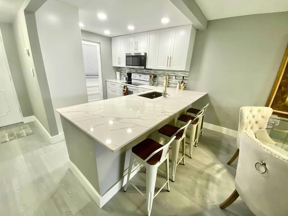 6461 Northwest 2nd Avenue, Unit 409 Boca Raton, FL 33487 - Photo 2 of 57 KITCHEN