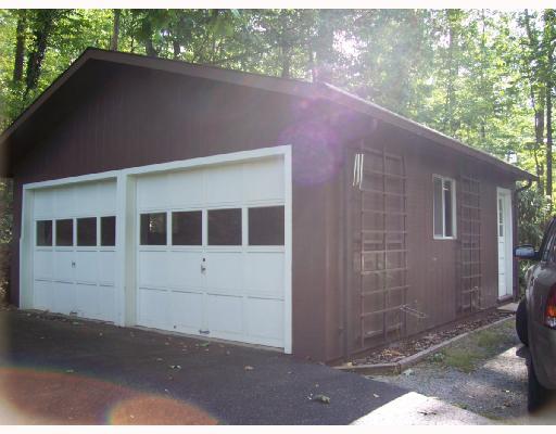 227 Woodcroft Road Economy, PA 15005 - Photo 3 of 12 Parking Lot/Garage. The two car garage is conveniently located near the rear door of the home.