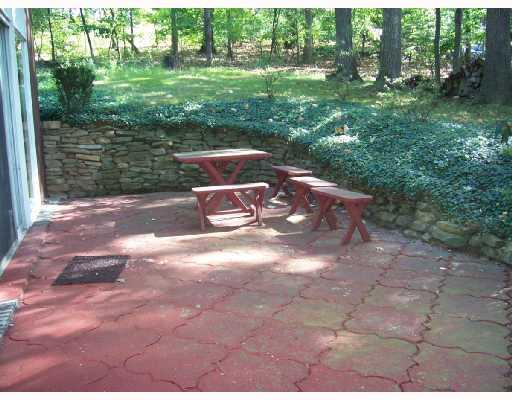 227 Woodcroft Road Economy, PA 15005 - Photo 4 of 12 Patio/Deck. Enjoy picnicing on the side patio located off the family room.