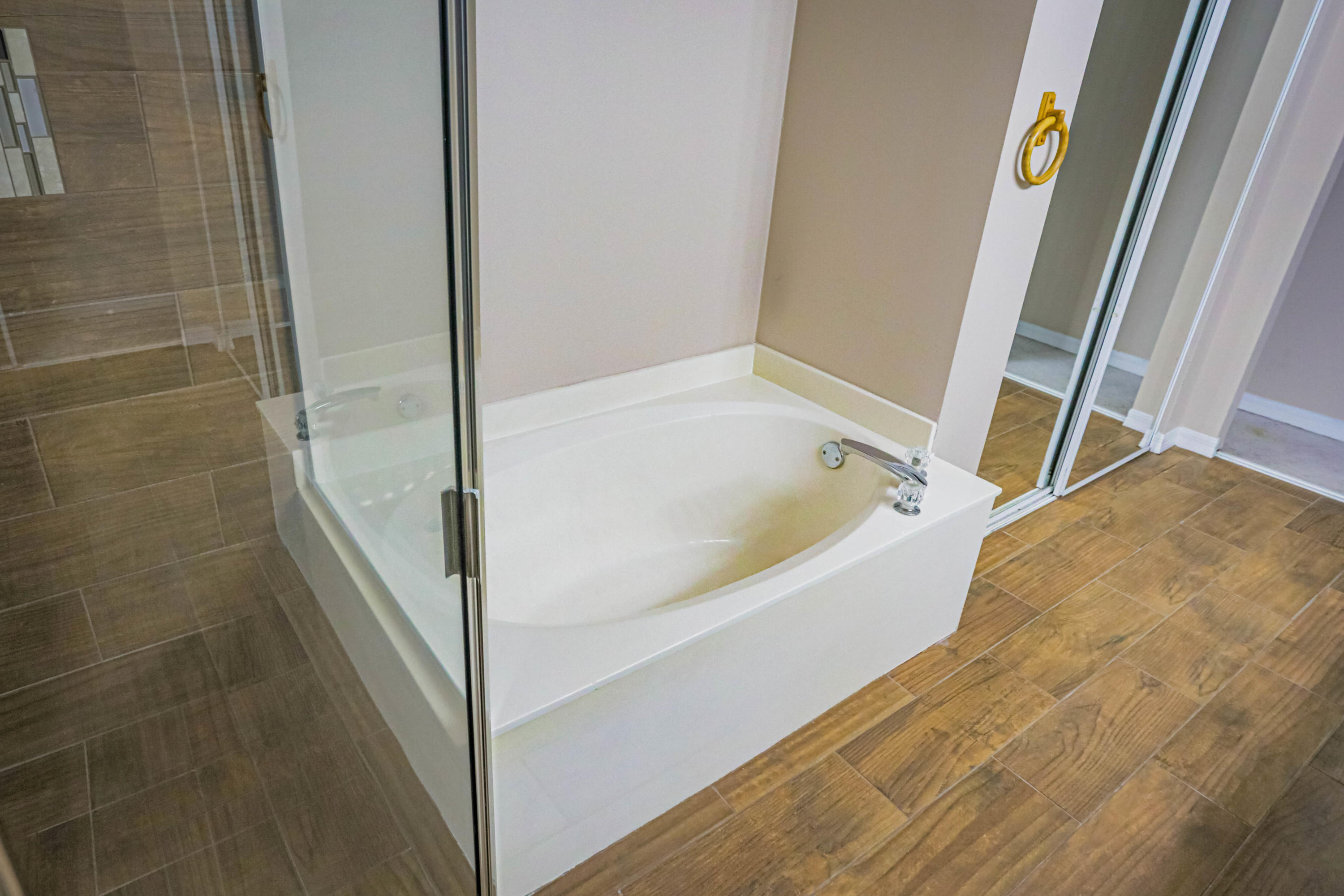 5218 Edenwood Road Riviera Beach, FL 33418 - Photo 11 of 31 a bathroom with a bathtub and shower