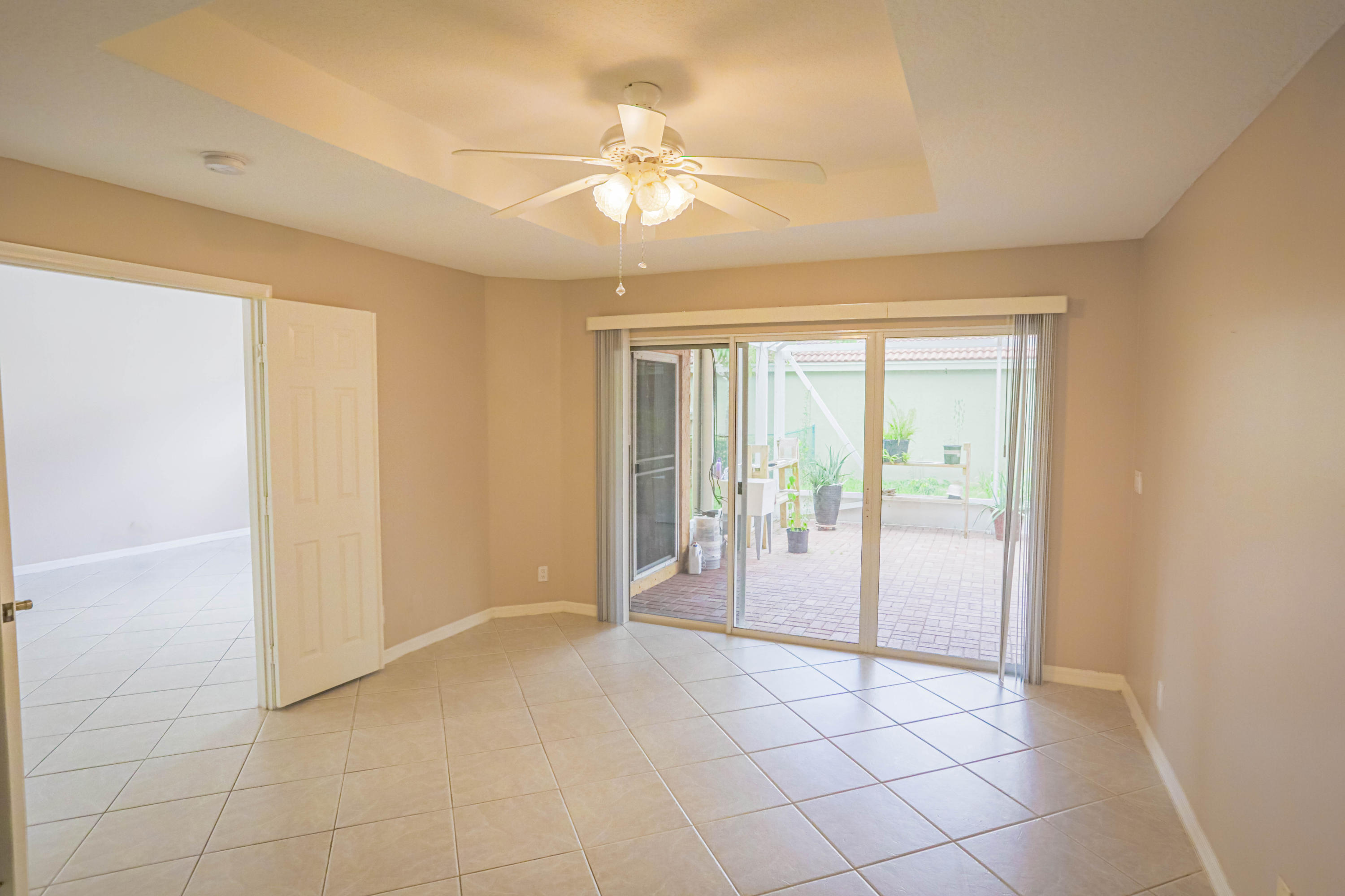 5218 Edenwood Road Riviera Beach, FL 33418 - Photo 7 of 31 a view of an empty room and window